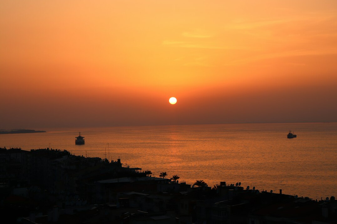 Sunset over the Izmir bay seen from the Kordon promenade